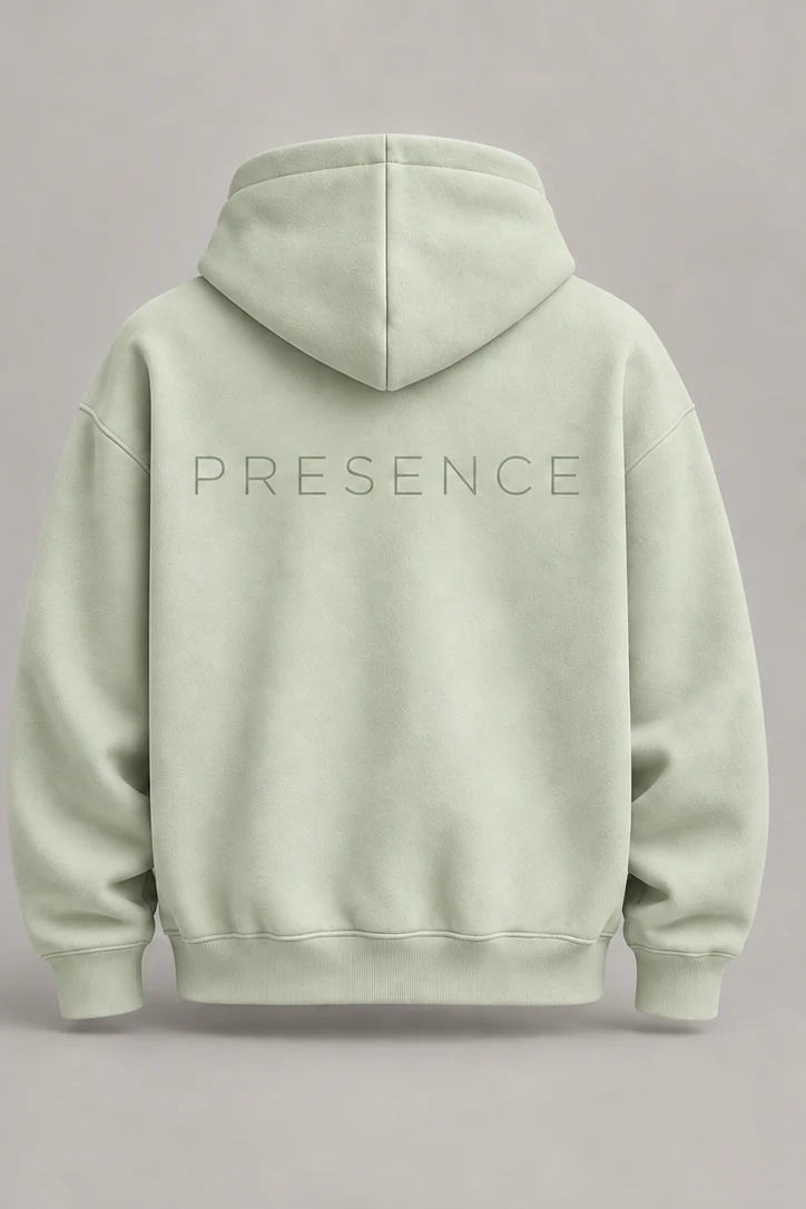 ORDANEL CORE Presence pastel green hoodie back with PRESENCE lettering